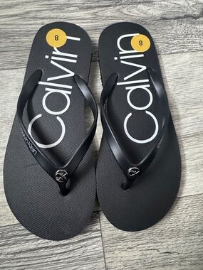 Calvin Klein Black Flip Flop Sandals with White Logo
